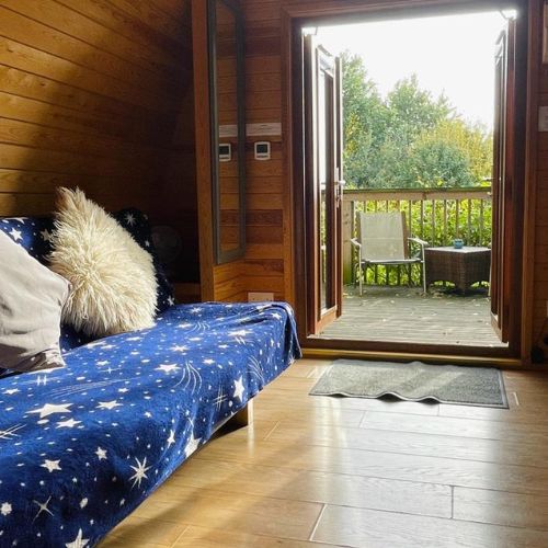 TreePod Internal Luxury TreePod, Sofa, decking and view, Wootton Wawen, Warwickshire, Wootton Park Pods